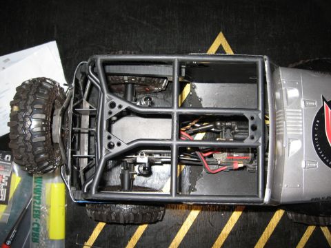1993 Toyota 4Runner - A remote control rock crawler with a detailed interior and exterior is shown from a top-down perspective.