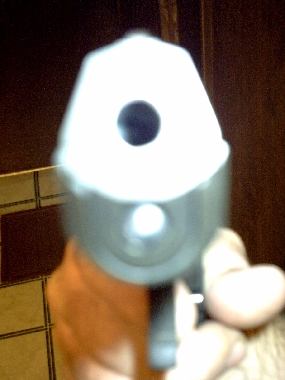 1995 Ford Bronco - This is a close-up of a gun barrel, not a vehicle.