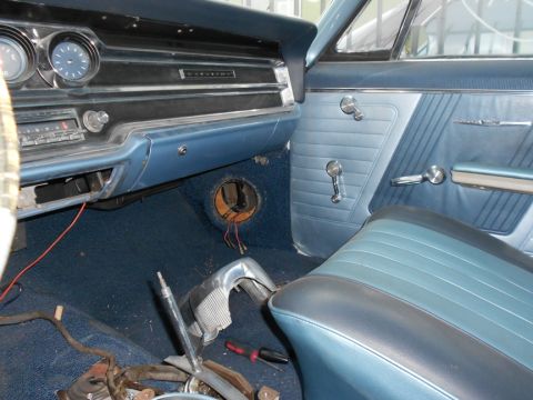 1965 Pontiac Catalina - Interior view of a 1965 Pontiac Catalina, the dashboard, seats, and door panel.