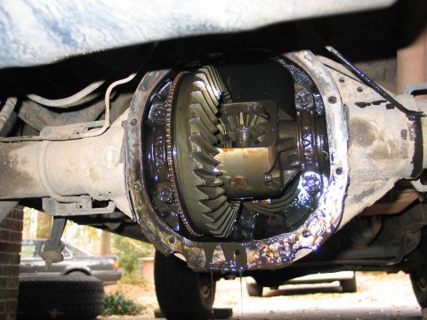 1995 Ford Bronco - remove the diff cover, and catch as much fluid as you can to reduce the clean-up afterwards