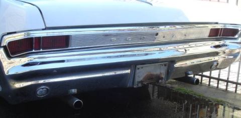 1965 Pontiac Catalina - Rear view of a 1965 Pontiac Catalina, showing its chrome bumper and taillight assembly.