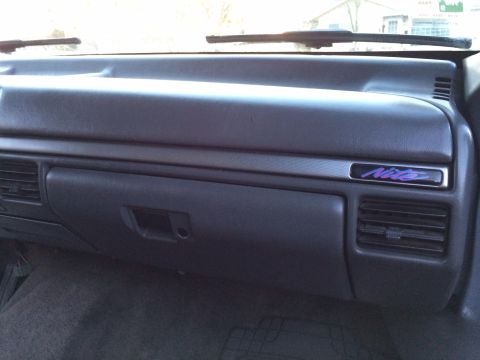 1992 Ford Bronco - Interior view of a 1992 Ford Bronco dashboard, showing the "Nite" trim badge.