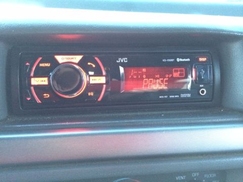 1992 Ford Bronco - JVC KD-X50BT car stereo showing PAUSE mode, with USB and AUX ports visible.