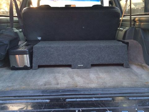 1992 Ford Bronco - Subwoofer box and cooler are visible in the cargo area of the vehicle.