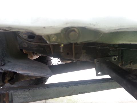 1992 Ford Bronco - lower mounting bolt that was giving me trouble..had to come back a grind off part of the tab so it wouldn't rub on the sliders.