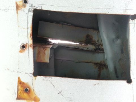 1992 Ford Bronco - shot from the inside of the sail panel, I was able to easily knock out the old reinforcement panels..you can already see the day light comi…
