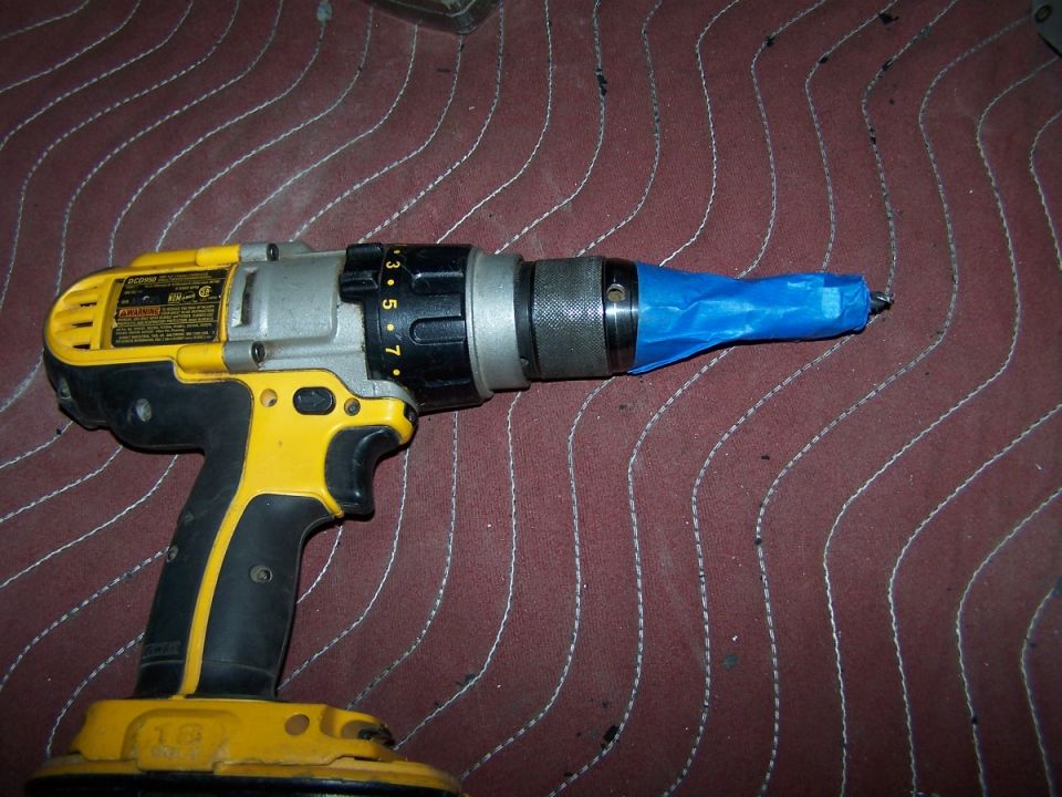 Then tape to hold them in place to drill out the pilot hole locations.