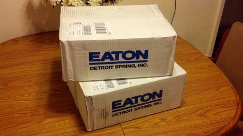 2003 Ford Crown Victoria - Boxes from Eaton Detroit Spring, Inc. are shown stacked on a table.