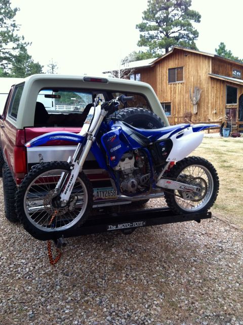 1994 Ford Bronco - 1994 Ford Bronco carrying a Yamaha dirt bike on a rear hitch carrier.
