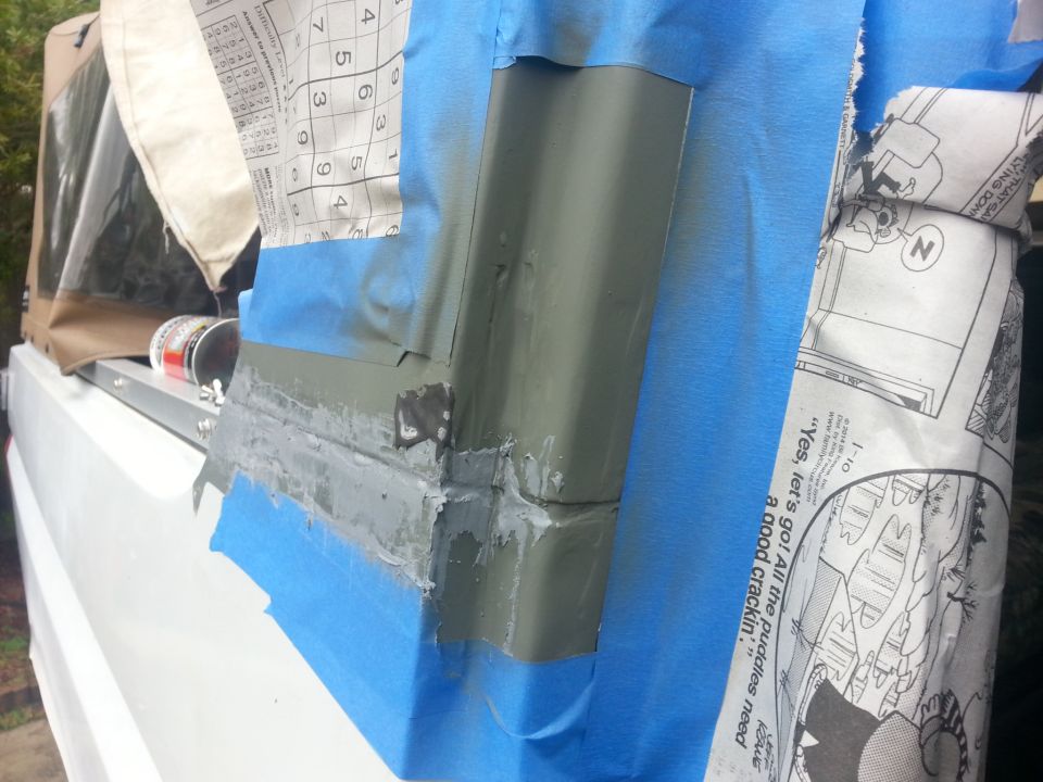 Body panel repair with masking tape and filler
