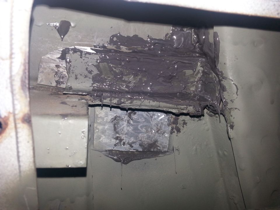 top reinforcement panel in place I put as much cold weld in there as possible.