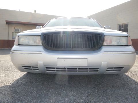 2002 Mercury Grand Marquis - Front view of a silver 2002 Mercury Grand Marquis, its distinctive black grille and headlights.