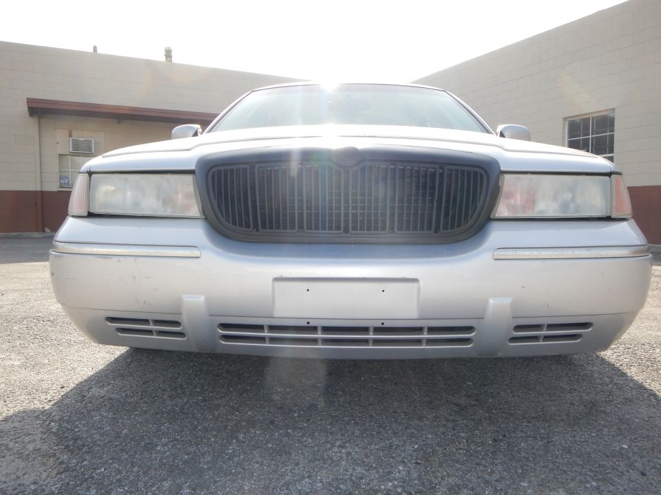 Silver 2002 Mercury Grand Marquis front view with black grille