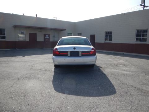 2002 Mercury Grand Marquis - Rear view of a silver 2002 Mercury Grand Marquis sedan parked in an outdoor lot.