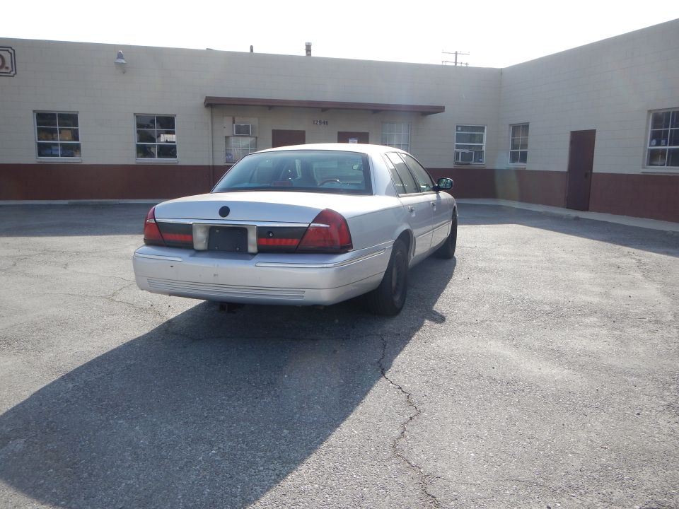 2002 Mercury Grand Marquis rear view parked in lot