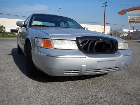 2002 Mercury Grand Marquis - Front view of a silver 2002 Mercury Grand Marquis parked outdoors.