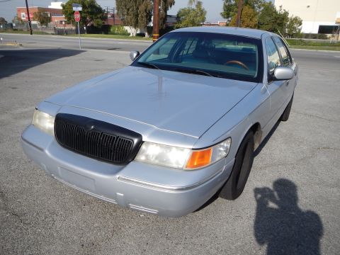 2002 Mercury Grand Marquis - Silver 2002 Mercury Grand Marquis sedan parked outdoors with a black grille.