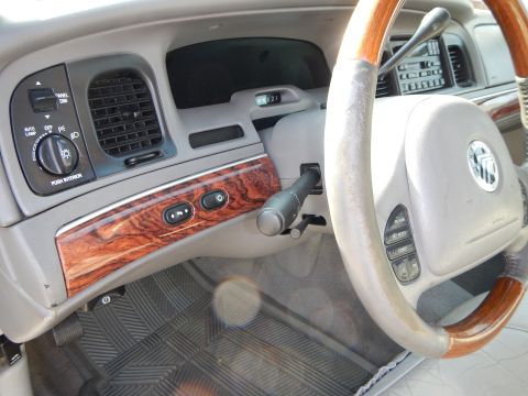 2002 Mercury Grand Marquis - Interior view of a 2002 Mercury Grand Marquis, highlighting the dashboard and steering wheel details.