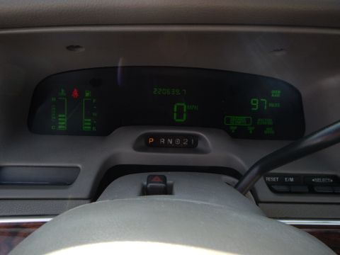 2002 Mercury Grand Marquis - Interior view of a digital dashboard displaying odometer, speed, and gear selection.
