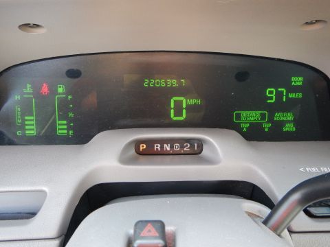 2002 Mercury Grand Marquis - The digital dashboard displays mileage, speed, and gear selection.