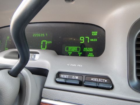 2002 Mercury Grand Marquis - The digital display shows the odometer reading, current speed, and distance to empty.