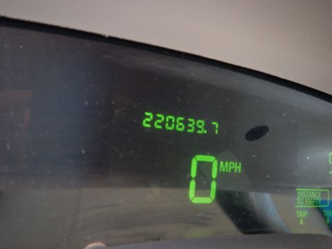 2002 Mercury Grand Marquis - The digital odometer displays 220,639.7 miles, while the speedometer reads 0 MPH.