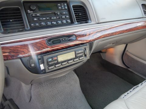 2002 Mercury Grand Marquis - Interior view of a 2002 Mercury Grand Marquis, showing the dashboard and center console.
