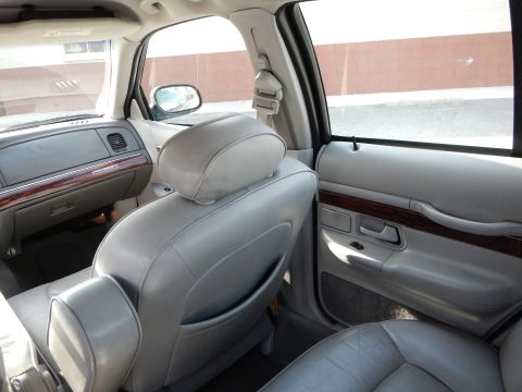 2002 Mercury Grand Marquis - Interior of a 2002 Mercury Grand Marquis, showing the dashboard and passenger seat.