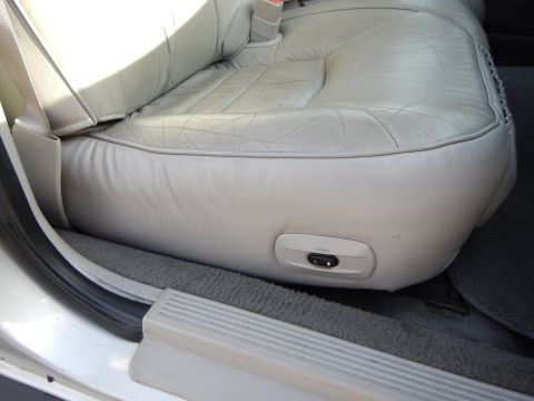 2002 Mercury Grand Marquis - The power seat controls are visible on the side of the seat base.