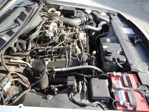 2002 Mercury Grand Marquis - View of the engine compartment, showing the V8 engine and associated components.