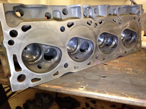 1993 Ford Bronco - Close-up of an engine cylinder head, showing the intake and exhaust ports.