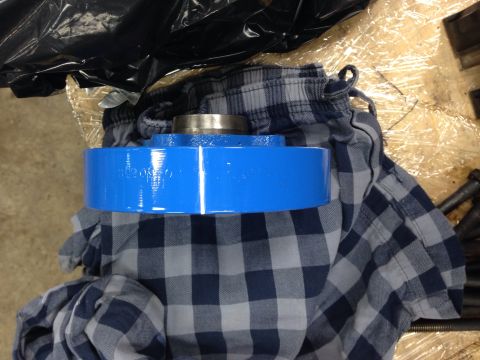 1993 Ford Bronco - A blue painted engine pulley is shown, with some text visible on its surface.