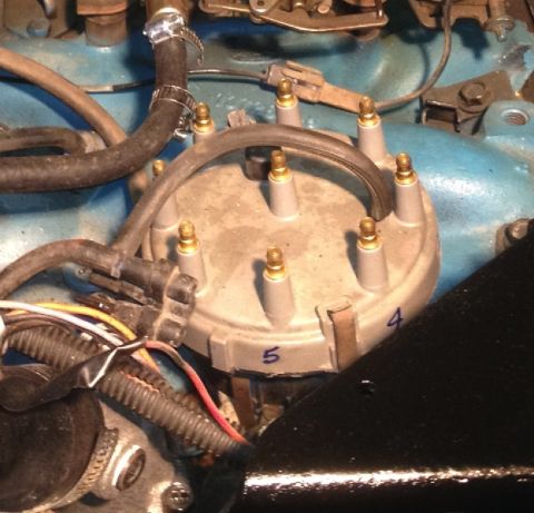 1978 Ford Bronco - Distributor cap and spark plug wires are visible in this engine bay detail shot.