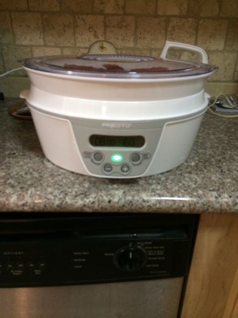 1968 Ford Mustang - A white Presto food dehydrator with a digital display sits on a kitchen counter.