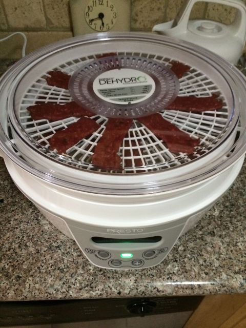 1968 Ford Mustang - A Presto dehydrator is shown with strips of jerky on its drying trays.