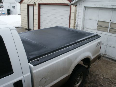 2000 Ford F-250 - Rear view of a 2000 Ford F-250 pickup truck a tonneau cover over the bed.