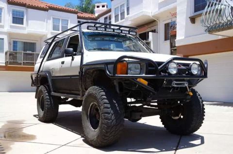 1985 Toyota 4Runner - This modified 1985 Toyota 4Runner features a custom roof rack and heavy-duty front bumper.