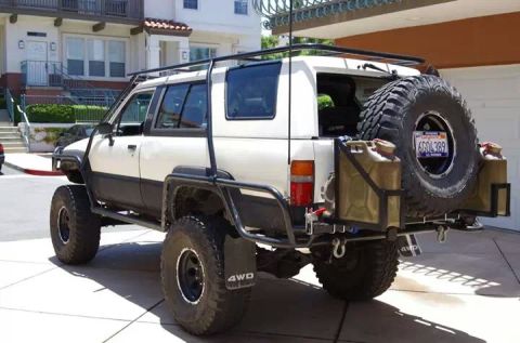 1985 Toyota 4Runner - This modified Toyota 4Runner features a custom rear bumper, spare tire carrier, and auxiliary fuel cans.