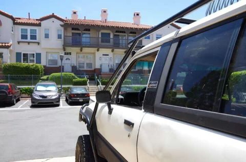 1985 Toyota 4Runner - Side view of a white 1985 Toyota 4Runner, a roof rack and visible 'TOYOTA' badging.