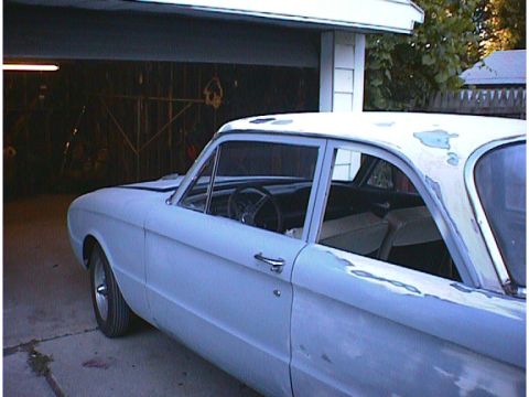 1960 Ford Falcon - This 1960 Ford Falcon sedan is undergoing restoration, showing primer and bodywork.