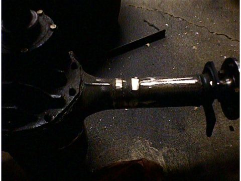 1960 Ford Falcon - Rear axle assembly and driveshaft detail, likely from a vintage vehicle.
