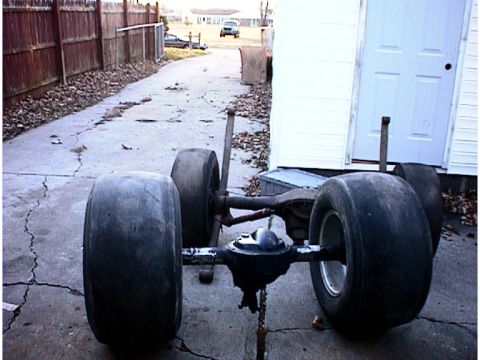 1960 Ford Falcon - Rear axle assembly with oversized tires, likely for a drag car or custom build.