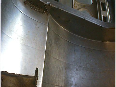 1960 Ford Falcon - This image shows the interior metalwork of a 1960 Ford Falcon, with visible welds and curved panels.