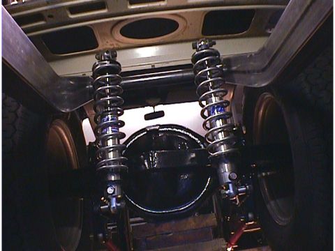 1960 Ford Falcon - Custom rear suspension setup with coilover shocks and a differential housing.