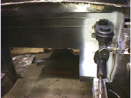 1960 Ford Falcon - Close-up view of a brake master cylinder and reservoir assembly, likely from a vehicle undergoing restoration or repair.