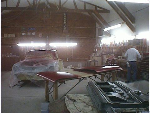 1960 Ford Falcon - Car undergoing paintwork in a workshop, with disassembled parts laid out.