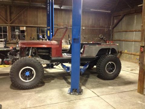 1985 Jeep CJ7 - This 1985 Jeep CJ7 is undergoing a custom build with a lifted suspension and large tires.