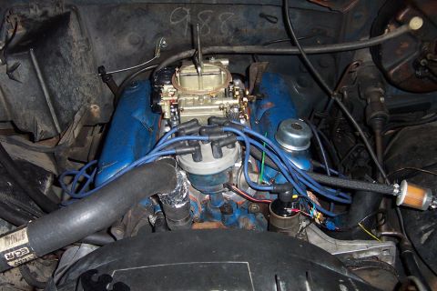 1980 Ford Bronco - Close-up of a Ford V8 engine, focusing on the intake and carburetor system.