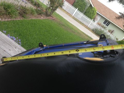 1986 Ford Bronco - A measuring tape is placed over a black seat cushion, indicating a length of 16 inches.