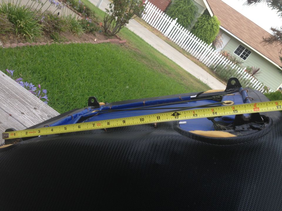 Seat cushion with measuring tape showing 16 inches